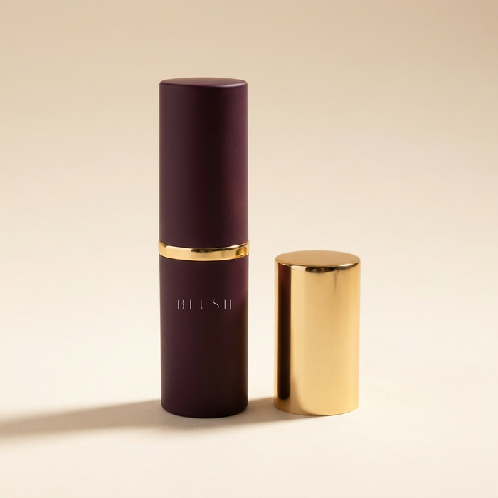 Blush Adaptive Foundation Stick, plum tube with gold cap