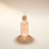 Blush Serum Skin Tint, frosted glass dropper bottle with gold collar