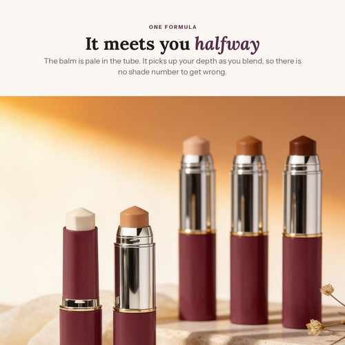 A line of Blush foundation sticks in warm light, tips ranging from white through fair and tan to deep